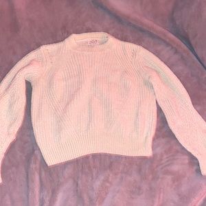 Poof apparel sweater in a cream color. Size small.